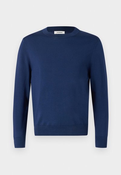 Ναυτικό μπλε πλεκτό πουλόβερ, με στρογγυλή λαιμόκοψη, μακριά μανίκια, ριμπ μανσέτες και στρίφωμα, ομαλή υφή, ελαφρύ υλικό, απλός σχεδιασμός.