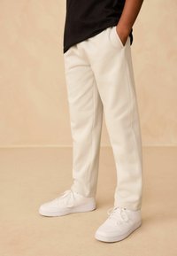 Pantaloni ampi in twill - Grigio scuro mélange - DONNA | H&M IT