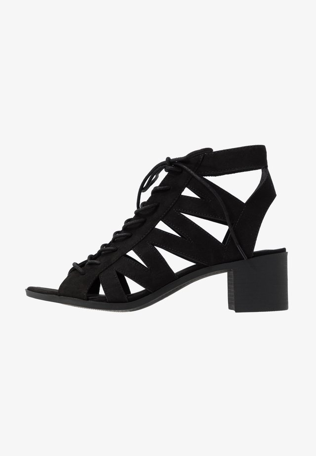 PELICAN - Sandalias tobilleras - black