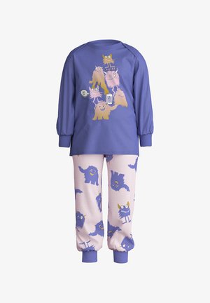 Paarse lange mouwen pyjama-top met kleurrijke monster graphics, gecombineerd met roze broek met verschillende monsters op een gestreepte achtergrond.