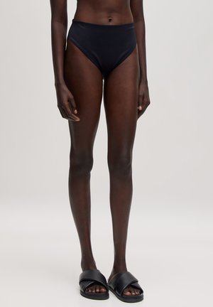 Schwarze Bikinislips mit hoher Taille aus glattem, dehnbarem Stoff. Klassischer Schnitt mit klaren Linien und ohne sichtbare Muster.