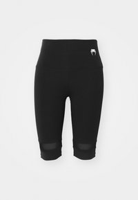 Svart sykkelshorts med høy midje, med en glansfull midjebåndlogo og gjennomsiktige mesh-paneler nederst. Glatt, elastisk stoff.
