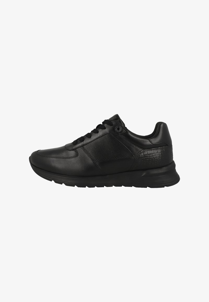 Black sneaker featuring smooth leather and textured accents. Rounded toe, lace-up front, and a wide rubber sole for support and traction.