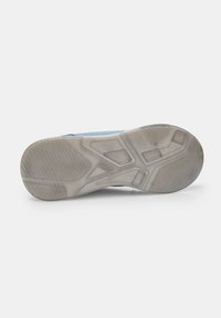 Shoe sole, textured rubber in light gray with a tread pattern, features a lighter blue trim, contoured shape, and multiple grooves for traction.