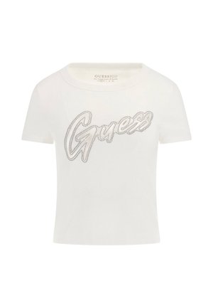 Fehér bordás póló, elöl egy kiemelkedő ezüst hímzett "Guess" logóval. Rövid ujjú és kerek nyakú dizájn.