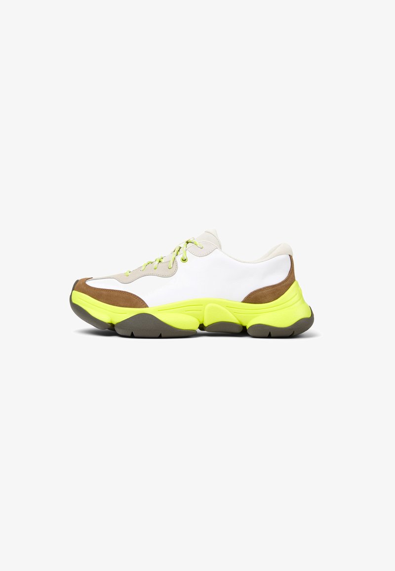 Sneakers with a white leather upper, brown suede accents, and a bright yellow rubber sole. Features green laces and a rounded design.