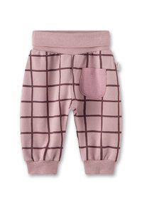 Rosa Jogginghosen mit einem Karomuster in Dunkelbraun, ausgestattet mit einem gerippten Bund, Bündchen und einer einzelnen aufgesetzten Tasche auf der Rückseite.
