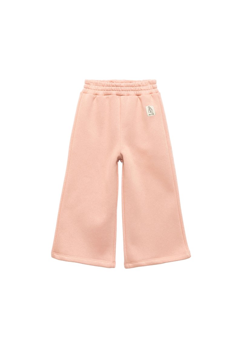 Jasnoróżowe, szerokie spodnie dresowe z elastycznym pasem i małą metką z logo. Miękka tkanina o gładkiej strukturze, bez wzoru ani akcentów.
