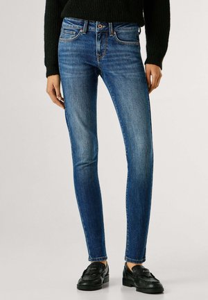 Kitsa lõikega teksad - denim