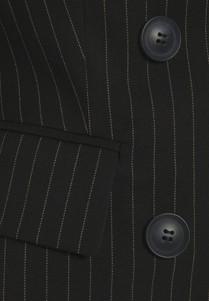 Black pinstripe blazer featuring a pocket, two dark buttons, and contrasting gold stitching. The fabric has a smooth, textured finish.