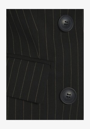 Black pinstripe blazer featuring a pocket, two dark buttons, and contrasting gold stitching. The fabric has a smooth, textured finish.