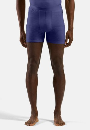 Violette Boxershorts mit glatter Textur, elastischem Bund und enganliegendem Design. Mit einem mittelhohen Schnitt und kurzer Beinlänge.
