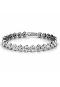 Bracelet en argent avec des pierres claires en forme ronde et florale alternées, doté d'un fermoir sécurisé et d'une finition lisse et polie.