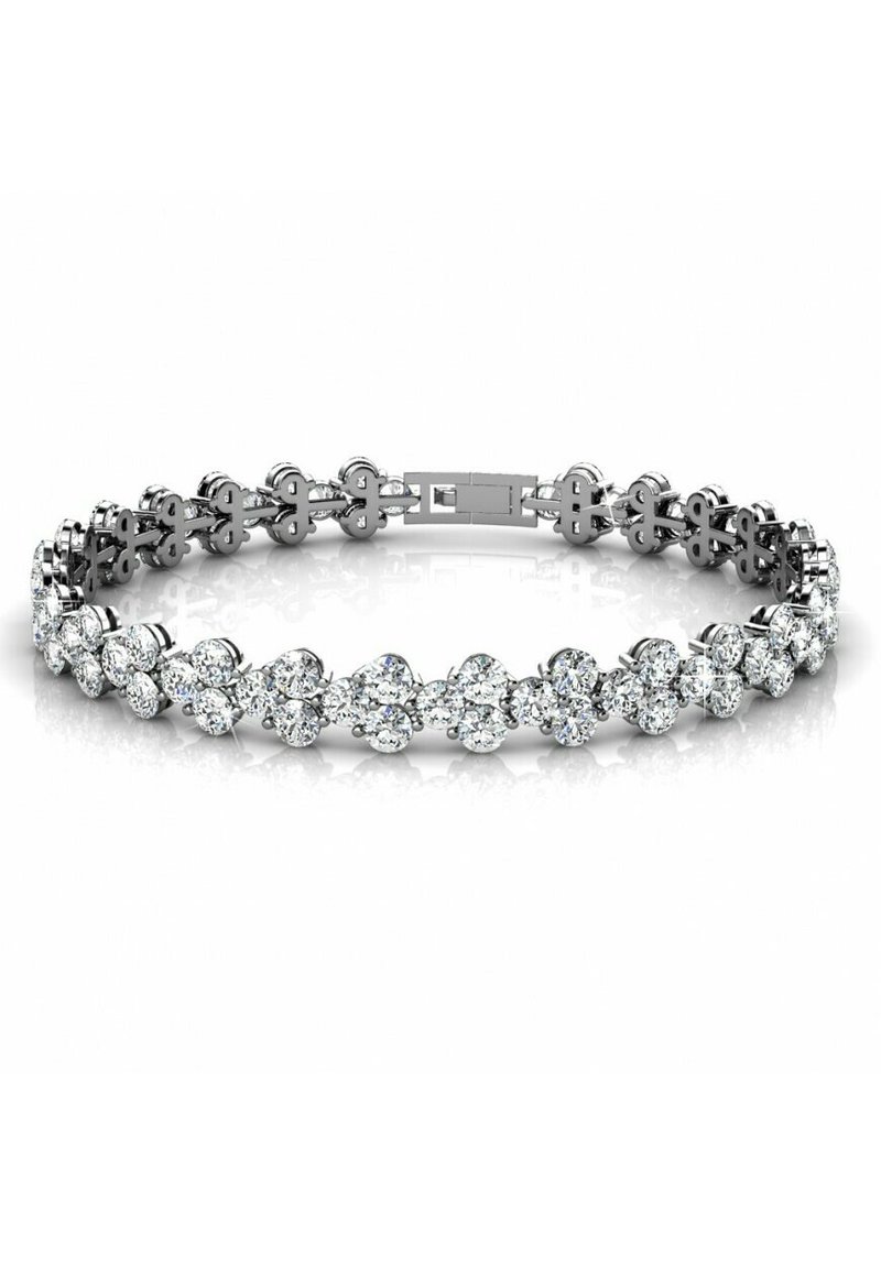 Bracelet en argent avec des pierres claires en forme ronde et florale alternées, doté d'un fermoir sécurisé et d'une finition lisse et polie.