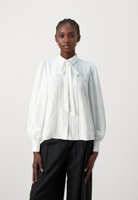JDY JDYTRAIN - Blouse - cloud dancer
