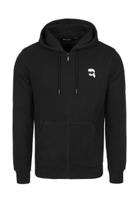 Felpa con zip nera realizzata in tessuto misto cotone, con tasca a canguro e logo grafico bianco sul lato sinistro del petto.