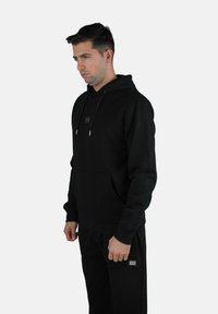 Redskins CHICAGO - Sweat à capuche - noir