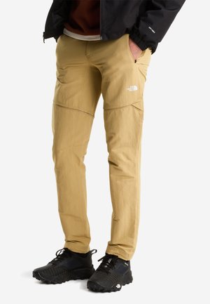 - Długie spodnie trekkingowe