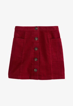 Jupe en velours côtelé rouge avec fermeture à boutons devant et deux grandes poches latérales, coupe droite au-dessus du genou.