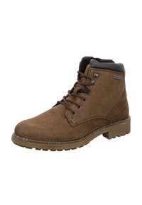 Bottes en cuir marron avec un haut de cheville, bout rond et finition texturée. Dotées d'un laçage à l'avant, d'œillets en métal et d'une semelle en caoutchouc avec un motif de crampons.