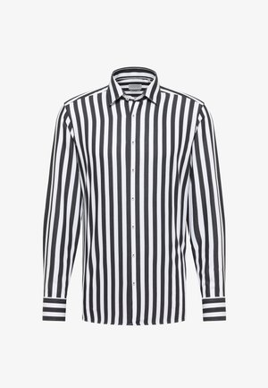 Stribet skjorte med sort og hvid lodrette striber, knap-ned krave, lange ærmer og accentstriber på ærmerne. Glat stofstruktur.
