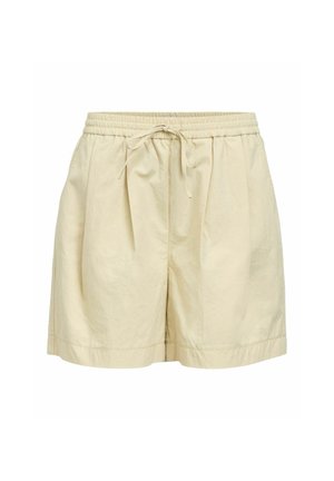 Short beige à coupe ample avec taille élastique et cordon, présentant des plis devant et un ourlet droit.