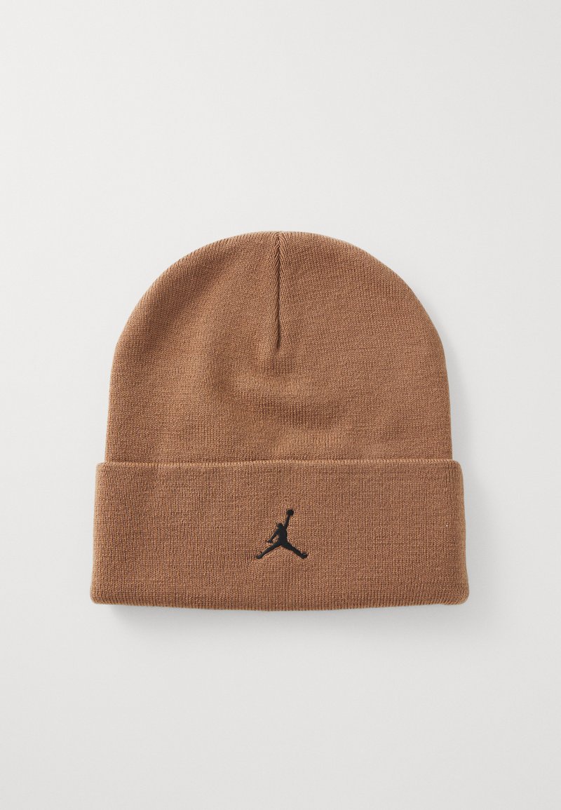 Brown knit beanie featuring a folded cuff and a black Jordan logo embroidered on the front. Soft texture, standard beanie shape.