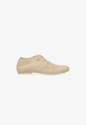 Beige suede men's casual lace-up shoe with low heel and rounded toe, shown from the side on a white background.