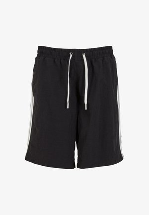 Kergekaalulised mustad lühikesed püksid elastse vöökoha, valgete paelte ja valgete külgtriipudega.