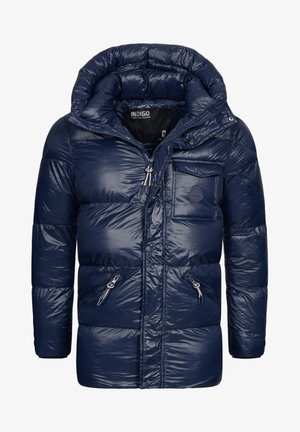 Navy puffer jacket with a shiny, quilted surface, a hood, front zip closure, and side pockets. Features a chest pocket with a logo patch.