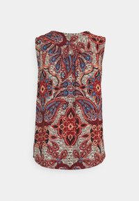 Haut sans manches avec motif floral cachemire rouge, bleu et beige et détail froncé dans le haut du dos.