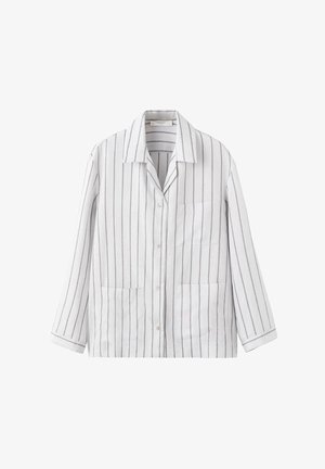 Weißes Hemd mit schwarzen Vertikalstreifen, langen Ärmeln, Kragen und drei vorderen Taschen.