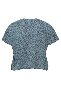 Lichtblauw kortarm top met een geometrisch patroon van zwarte lijnen. Zacht stof, losse pasvorm, ronde halslijn en rechte zoom.