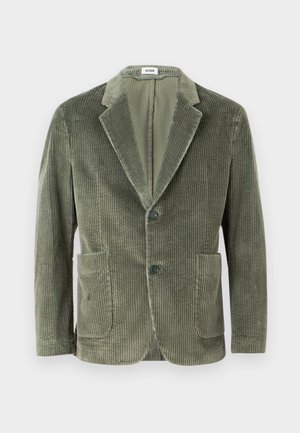 Green corduroy blazer with a notch lapel, two front pockets, and two buttons. Features vertical ribbed texture and a relaxed fit.