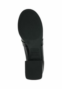 Black high-heeled shoe featuring a textured upper, a square heel, and a rubber sole with a patterned grip for traction.