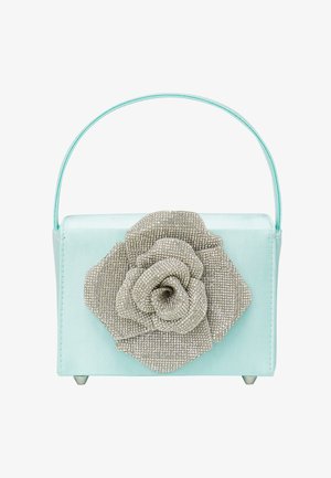 En mintgrøn firkantet håndtaske lavet af satin, der har en stor metalisk sølvblomst dekorativt element og et klart håndtag.