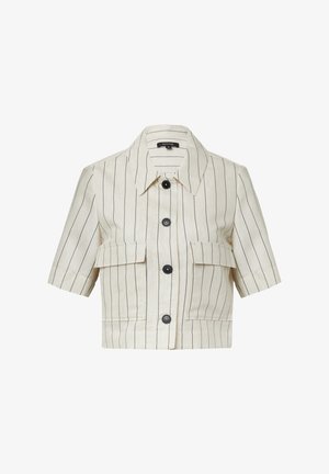 Krótka kurtka z rękawem w jasnobeżowym materiale z wąskimi czarnymi paskami. Posiada kołnierz, zapięcie na guziki oraz dwie przednie kieszenie.