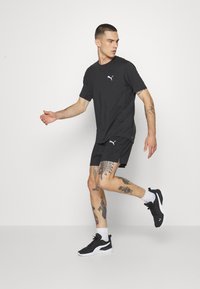 Puma RUN CLOUDSPUN - T-Shirt sport - puma black