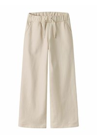 Beige weit geschnittene Hose mit elastischem Bund, verstellbarem Kordelzug und Seitentaschen, aus weichem Stoff.
