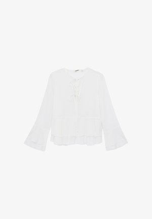 White long-sleeve blouse with flared cuffs, tiered ruffle hem, and front tie closure at the neckline.