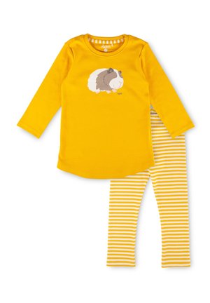 Gelbes Langarmtop mit einem Meerschweinchen-Graphic, kombiniert mit weißen und gelben gestreiften Leggings in einem Kinderbekleidungsset.