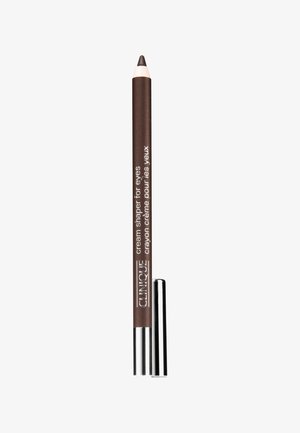 Brun cremet eyeliner blyant med spids spids, metallisk sølv casing i bunden og hvidt tekstlabel. Glat tekstur til påføring.