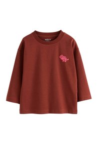 Rostfarbener Langarm-T-Shirt mit einem pinkfarbenen Dinosaurier-Graphic auf der linken Brust und einem gerippten Ausschnitt.