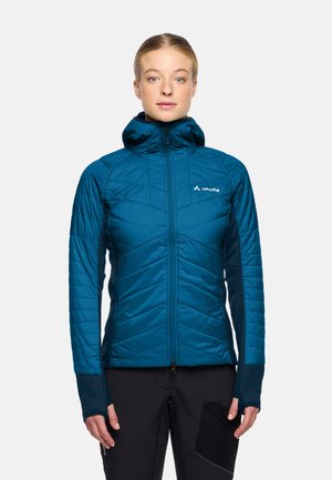 Teal geïsoleerde jas met capuchon, featuring een chevron-gestikte ontwerp en contrasterende donkerblauwe mouwen. Voorzien van ritszakken en duimhole.