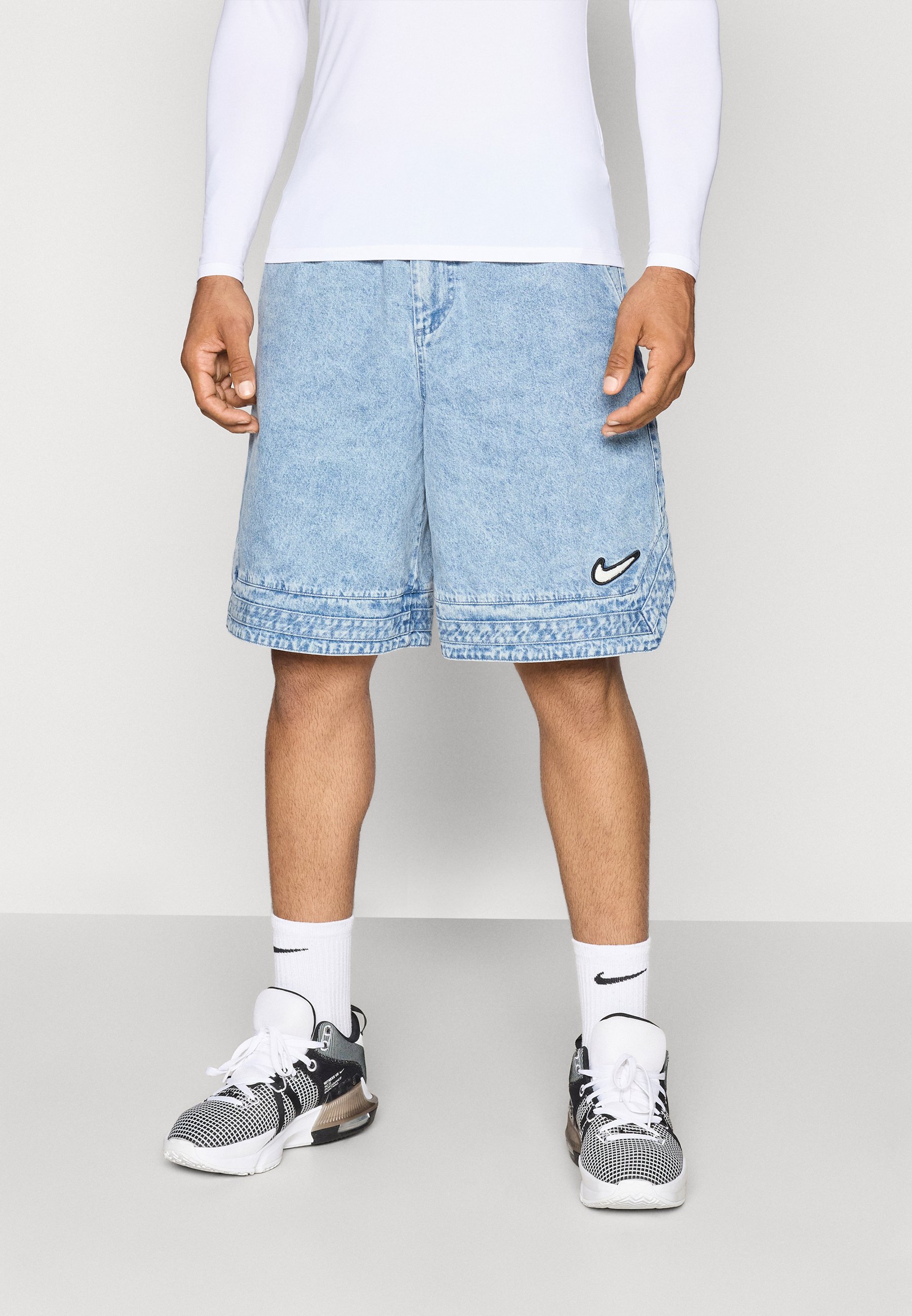 Nike Performance DENIM 10IN SHORT NAOS - Sports shorts