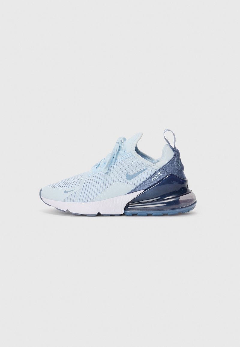 Light blue Nike Air Max 270 sneaker with mesh upper, white midsole, navy blue heel with visible air cushion, and laces tied.