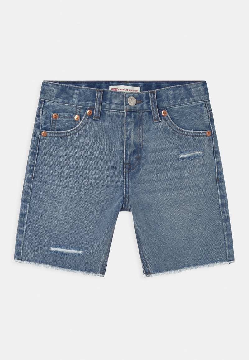 Džínové šortky ve středně modré barvě, se třepeným lemem, pěti kapsami a měděnými nýty. Světle poškozený vzhled na přední části.