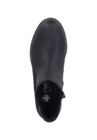 Bottines noires en cuir texturé, avec un bout arrondi et une fermeture éclair sur le côté pour un enfilage facile. Marquage intérieur visible.