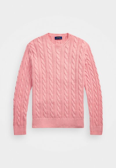 Rozā adīta džemperis ar apaļu izgriezumu un ribu apakšmalu. Iezīmē teksturētu rakstu un garām piedurknēm. Izgatavots no mīksta adīta materiāla.