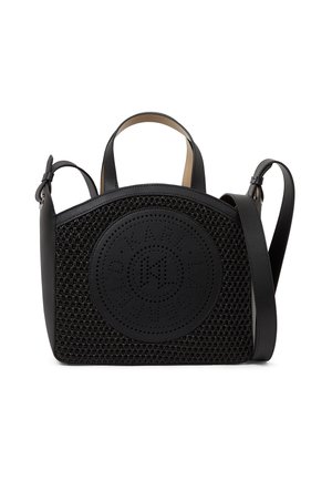 Black woven handbag with rounded top, leather handles, adjustable shoulder strap, and a perforated circular logo patch on the front.